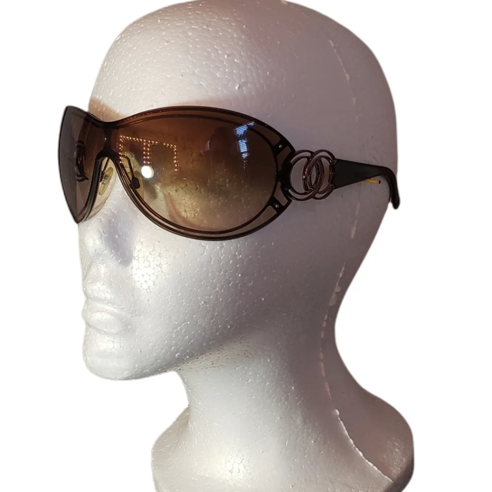 CHANEL Black Frames with Brown Gradient Lenses and Gold CC Accent Sunglasses.